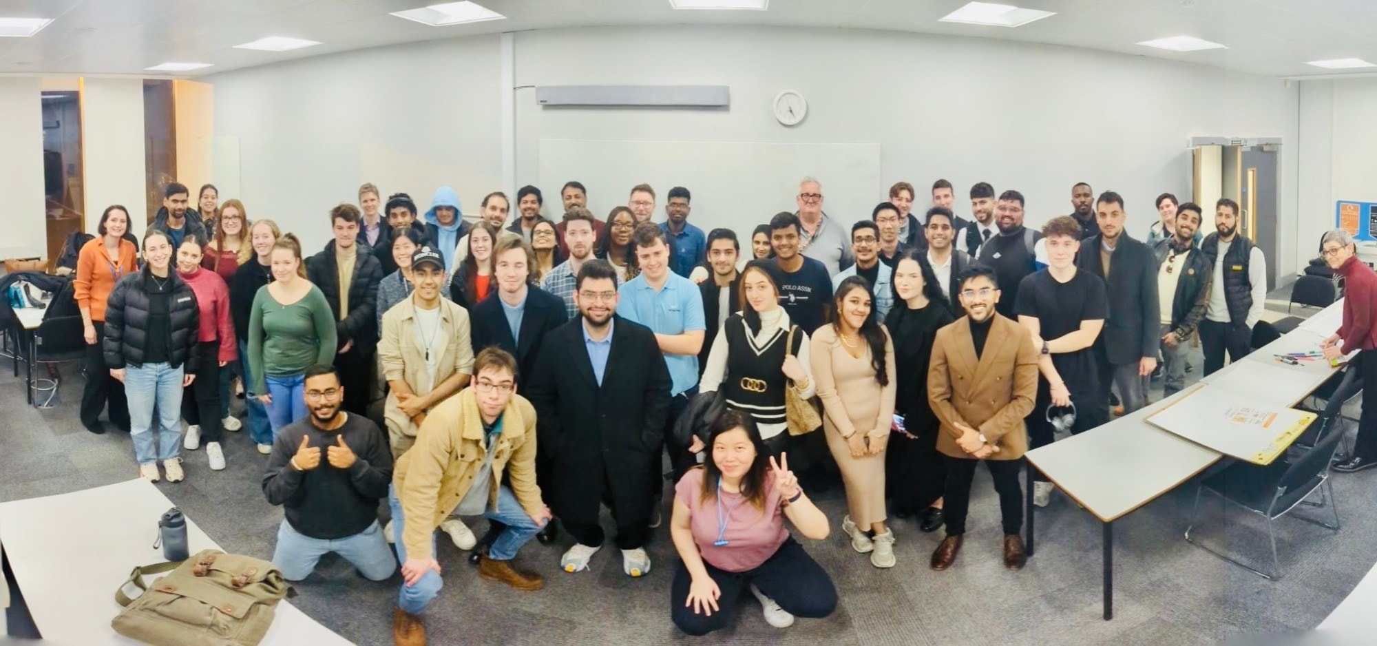 Group photo of workshop attendees with Ricky
